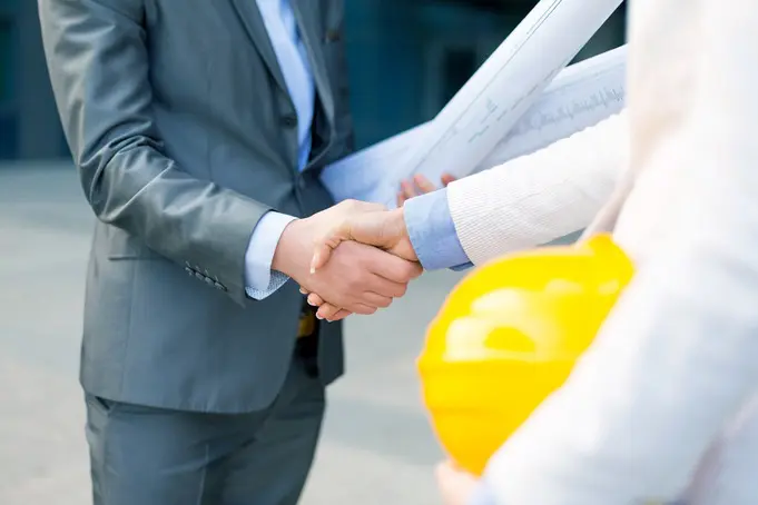 permit management partners shaking hands